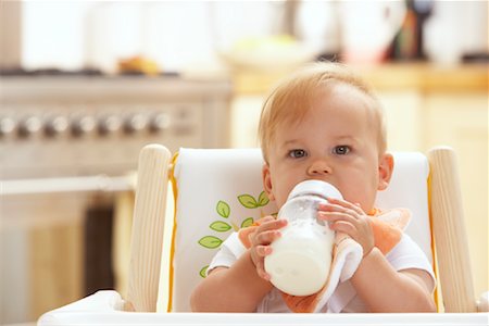 Baby in High Chair Stock Photo - Premium Royalty-Free, Code: 600-01015376