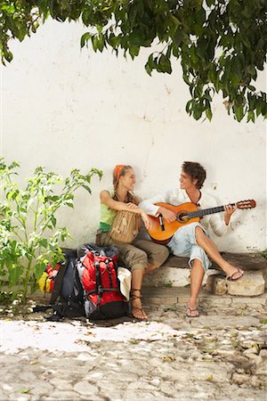 playing guitar and drums - Backpackers Outdoors, Spain Stock Photo - Premium Royalty-Free, Code: 600-01015518