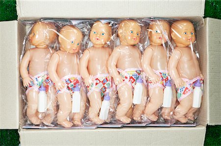 Baby Dolls in Box Stock Photo - Premium Royalty-Free, Code: 600-01036741