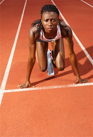 Femme sur les Starting Blocks Photographie de stock - Premium Libres de Droits, Code: 600-01037054