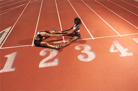 simsearch:600-01604089,k - Women Stretching on Track Stock Photo - Premium Royalty-Free, Code: 600-01037090