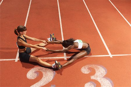 simsearch:600-01764684,k - Women Stretching on Track Stock Photo - Premium Royalty-Free, Code: 600-01037091