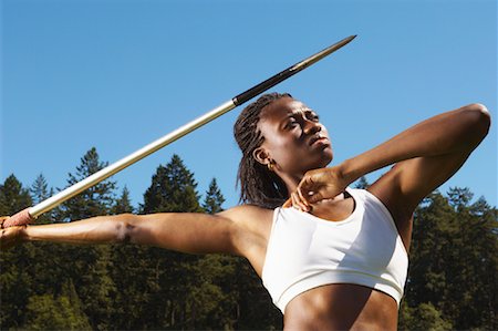 simsearch:673-02138831,k - Portrait of Woman Holding Javelin Foto de stock - Sin royalties Premium, Código: 600-01037114