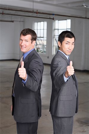 simsearch:846-05647898,k - Portrait of Businessmen making Hand Gestures Stock Photo - Premium Royalty-Free, Code: 600-01037449