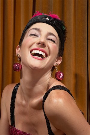 simsearch:600-01037610,k - Portrait of Woman Laughing Fotografie stock - Premium Royalty-Free, Codice: 600-01037604