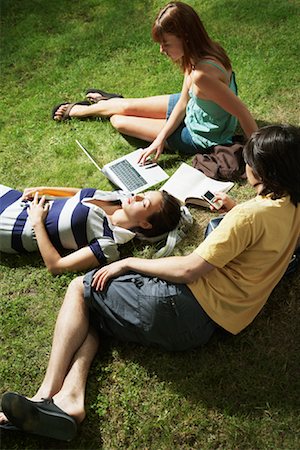 student college laptop lying grass - Group of Students Outdoors Stock Photo - Premium Royalty-Free, Code: 600-01030378