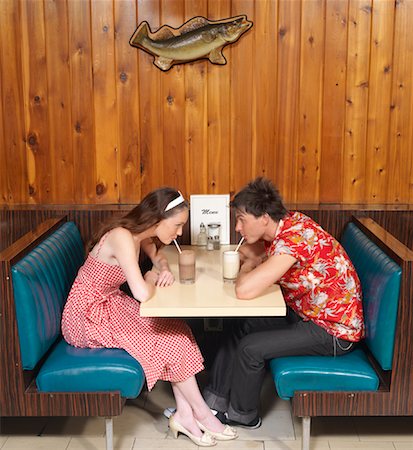 retro men drinking - Couple Sitting in Diner Stock Photo - Premium Royalty-Free, Code: 600-01041432