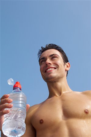 satisfied (thirst) - Man Drinking Water Foto de stock - Sin royalties Premium, Código: 600-01041666