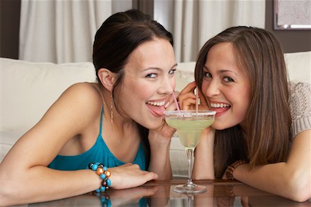 Friends Sharing Margarita Stock Photo - Premium Royalty-Free, Code: 600-01041838