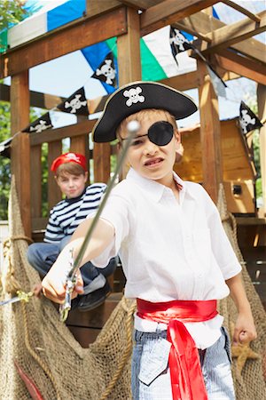 Portrait of Boy Pretending to be a Pirate Foto de stock - Sin royalties Premium, Código: 600-01042030