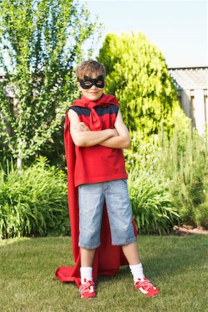 smile as mask for boy - Portrait of Boy Wearing Super Hero Costume Stock Photo - Premium Royalty-Free, Code: 600-01042046