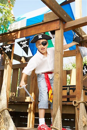 Portrait of Boy Pretending to be a Pirate Stock Photo - Premium Royalty-Free, Code: 600-01042042