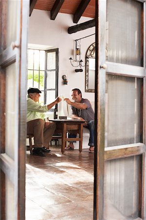 simsearch:600-01616604,k - Father and Son Drinking Wine Stock Photo - Premium Royalty-Free, Code: 600-01043316