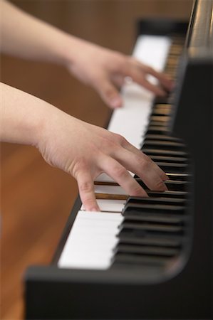 Hands Playing Piano Stock Photo - Premium Royalty-Free, Code: 600-01072275