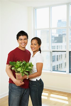 philippino couple - Couple in Condo Stock Photo - Premium Royalty-Free, Code: 600-01073463