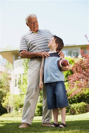 simsearch:600-01043375,k - Portrait of Grandfather with Grandson Stock Photo - Premium Royalty-Free, Code: 600-01073541