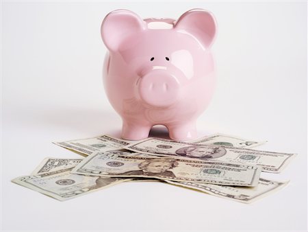 simsearch:600-02346262,k - Piggy Bank and Cash Stock Photo - Premium Royalty-Free, Code: 600-01073557