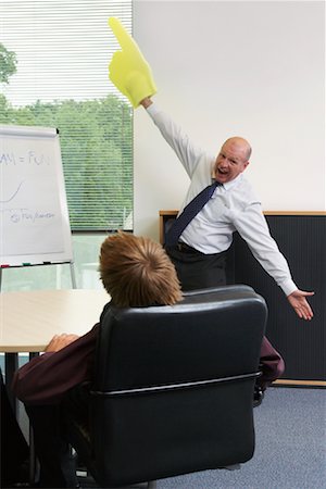 successful business man with graphs - Manager and Staff in Meeting Stock Photo - Premium Royalty-Free, Code: 600-01083322