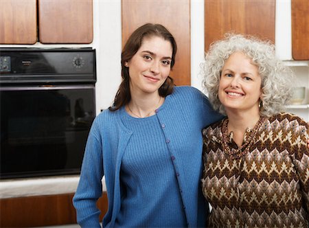 simsearch:600-01083705,k - Mother and Daughter in Kitchen Stock Photo - Premium Royalty-Free, Code: 600-01083713