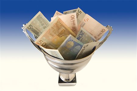 simsearch:614-06813505,k - Euro Dollars in Silver Cup Stock Photo - Premium Royalty-Free, Code: 600-01100181