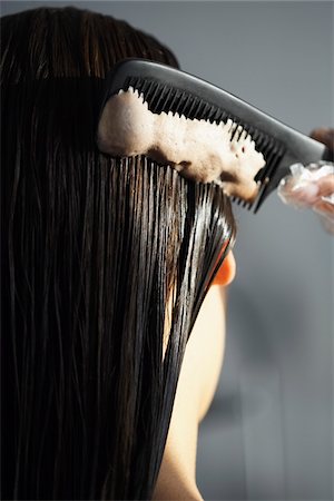 dyeing - Woman Applying Hair Coloring Stock Photo - Premium Royalty-Free, Code: 600-01119716