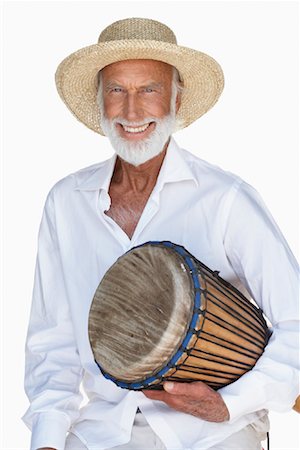 Portrait of Man in Straw Hat with Drum Foto de stock - Sin royalties Premium, Código: 600-01119907