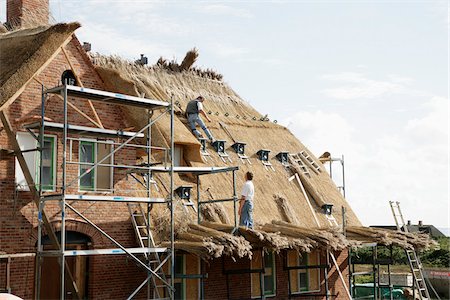 Roofers on Rooftop, Sylt, Germany Foto de stock - Royalty Free Premium, Número: 600-01119998