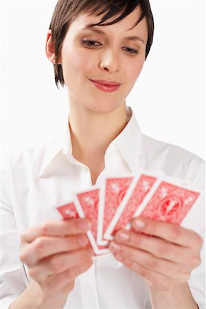 simsearch:600-01110057,k - Woman Holding Cards Stock Photo - Premium Royalty-Free, Code: 600-01110064