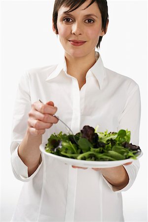 simsearch:600-01110057,k - Woman Eating Salad Stock Photo - Premium Royalty-Free, Code: 600-01110068
