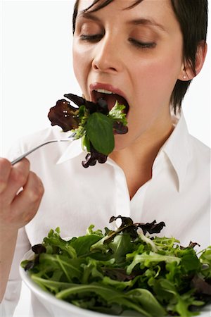 simsearch:600-01110057,k - Woman Eating Salad Stock Photo - Premium Royalty-Free, Code: 600-01110069