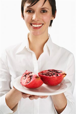 simsearch:600-01110057,k - Woman Holding Pomegranate Stock Photo - Premium Royalty-Free, Code: 600-01110070