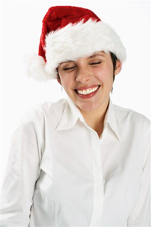 simsearch:600-01110057,k - Woman Wearing Santa Hat Stock Photo - Premium Royalty-Free, Code: 600-01110084