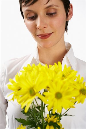 simsearch:600-01110057,k - Woman Holding Flowers Stock Photo - Premium Royalty-Free, Code: 600-01110081