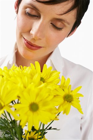 simsearch:600-01110057,k - Woman Holding Flowers Stock Photo - Premium Royalty-Free, Code: 600-01110082