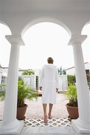 Man Walking onto Patio Stock Photo - Premium Royalty-Free, Code: 600-01110347