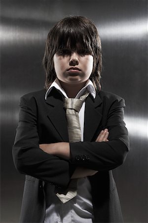 dark suit - Portrait of Boy Stock Photo - Premium Royalty-Free, Code: 600-01112031