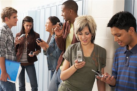 simsearch:700-02046618,k - Students in Hallway with Cellular Phones Stock Photo - Premium Royalty-Free, Code: 600-01112328