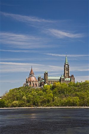 Parliament Buildings Across the Ottawa River, Ottawa, Ontario, Canada Stock Photo - Premium Royalty-Free, Code: 600-01112362
