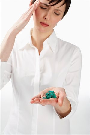 simsearch:600-01110057,k - Woman with Handful of Pills Stock Photo - Premium Royalty-Free, Code: 600-01112463