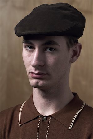 Portrait of Young Man Wearing Cap Stock Photo - Premium Royalty-Free, Code: 600-01112860