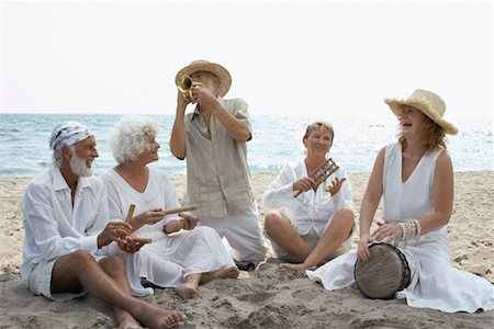 eccentric old woman - People Playing Music on Beach Stock Photo - Premium Royalty-Free, Code: 600-01112911