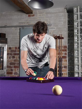 pool hall - Man Playing Pool Stock Photo - Premium Royalty-Free, Code: 600-01124008