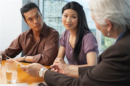 financial advising chinese - Couple Meeting with Financial Advisor Stock Photo - Premium Royalty-Free, Code: 600-01120162
