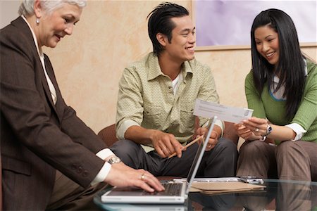 financial advising chinese - Couple Meeting With Financial Advisor Stock Photo - Premium Royalty-Free, Code: 600-01120181