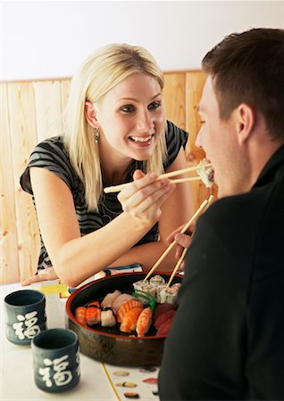 sushi restaurant - Couple in Japanese Restaurant Stock Photo - Premium Royalty-Free, Code: 600-01164294