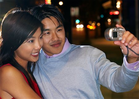 selfie at night - Couple Taking Self Portrait Stock Photo - Premium Royalty-Free, Code: 600-01164435