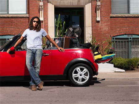 dreads teen - Portrait of Man in Front of Car Full of Belongings Stock Photo - Premium Royalty-Free, Code: 600-01164717