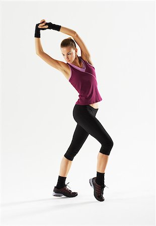 simsearch:600-01163683,k - Woman Exercising Photographie de stock - Premium Libres de Droits, Code: 600-01163670