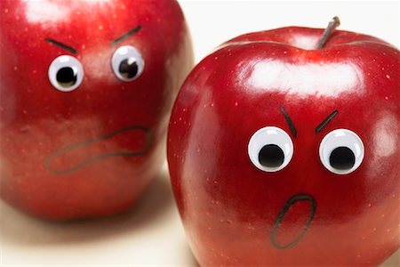 fruit eyes not children - Two Angry Apples Stock Photo - Premium Royalty-Free, Code: 600-01163772