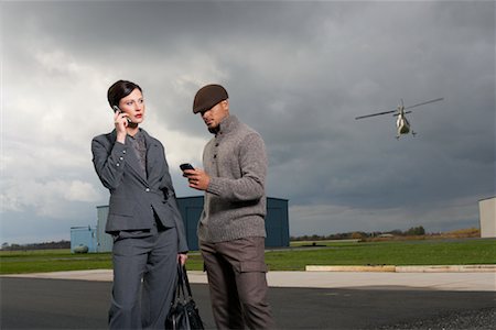 Gens d'affaires à l'aéroport Photographie de stock - Premium Libres de Droits, Code: 600-01174062